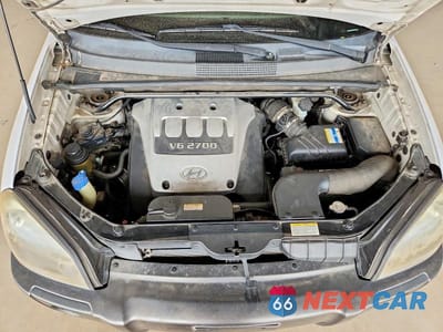 Zdjęcie 11 z 12 samochodu: 2006 HYUNDAI TUCSON GLS VIN:KM8JN72D76U334621 - miniatura