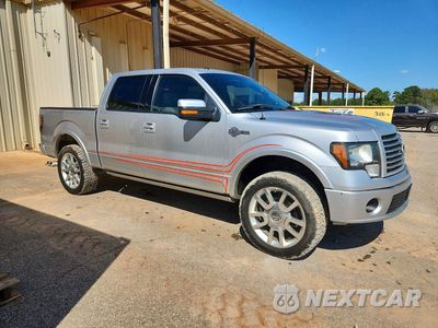 Czwarte zdjęcie samochodu z boku: 2011 FORD F150 SUPERCREW VIN:1FTFW1E67BFA56142 - miniatura
