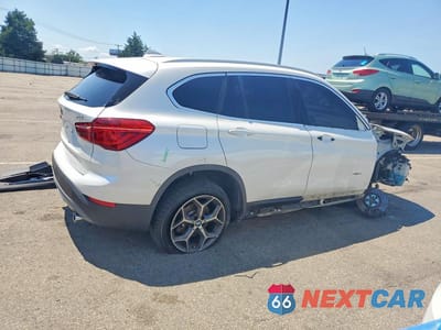 Trzecie zdjęcie samochodu z tyłu: 2017 BMW X1 XDRIVE28I VIN:WBXHT3C34H5F85087 - miniatura