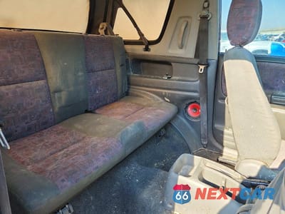 Zdjęcie 10 z 13 samochodu: 1999 CHEVROLET TRACKER VIN:2CNBJ18C3X6906067 - miniatura