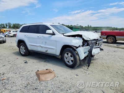 Czwarte zdjęcie samochodu z boku: 2013 JEEP GRAND CHEROKEE LAREDO VIN:1C4RJEAGXDC588412 - miniatura