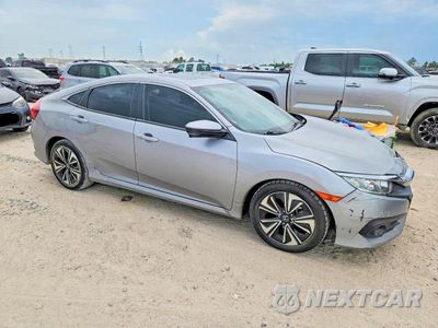 Czwarte zdjęcie samochodu z boku: 2018 HONDA CIVIC EX VIN:JHMFC1F34JX025984 - miniatura