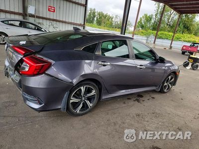Trzecie zdjęcie samochodu z tyłu: 2017 HONDA CIVIC TOURING VIN:2HGFC1F92HH647456 - miniatura
