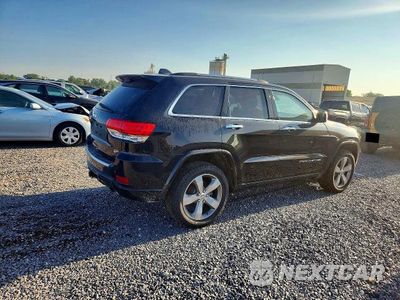 Trzecie zdjęcie samochodu z tyłu: 2012 JEEP GRAND CHEROKEE VIN:1C4RJFCG4EC467508 - miniatura