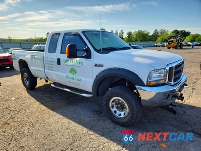 Czwarte zdjęcie samochodu z boku: 2004 FORD F250 SUPER DUTY VIN:1FTNX21L14EA85543 - miniatura