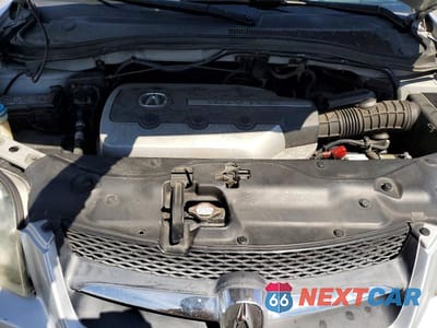Zdjęcie 12 z 14 samochodu: 2003 ACURA MDX TOURING VIN:2HNYD18623H533354 - miniatura