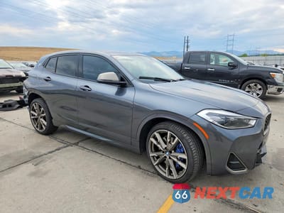 Czwarte zdjęcie samochodu z boku: 2022 BMW X2 M35I VIN:WBXYN1C06N5U40467 - miniatura