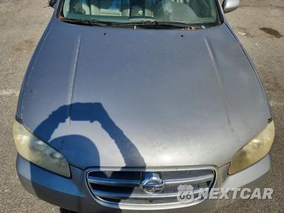 Zdjęcie 11 z 12 samochodu: 2002 NISSAN MAXIMA GLE VIN:JN1DA31D52T442813 - miniatura
