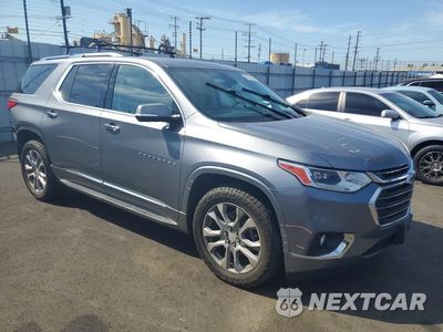 Czwarte zdjęcie samochodu z boku: 2018 CHEVROLET TRAVERSE PREMIER VIN:1GNERKKW6JJ270300 - miniatura