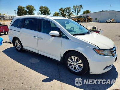 Czwarte zdjęcie samochodu z boku: 2016 HONDA ODYSSEY EXL VIN:5FNRL5H69GB140449 - miniatura