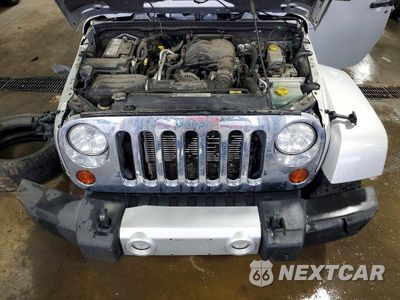 Zdjęcie 12 z 14 samochodu: 2012 JEEP WRANGLER UNLIMITED SAHARA VIN:1C4BJWEG6CL170624 - miniatura