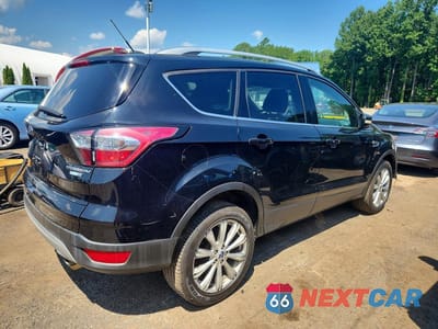 Trzecie zdjęcie samochodu z tyłu: 2017 FORD ESCAPE TITANIUM VIN:1FMCU9JD7HUE62613 - miniatura