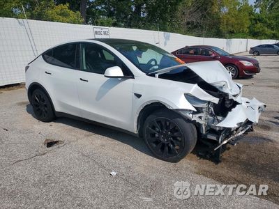 Czwarte zdjęcie samochodu z boku: 2023 TESLA MODEL Y VIN:7SAYGDEE6PA081804 - miniatura