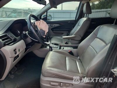 Zdjęcie 7 z 13 samochodu: 2017 HONDA PILOT TOURING VIN:5FNYF5H92HB008387 - miniatura