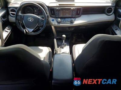 Zdjęcie 8 z 13 samochodu: 2018 TOYOTA RAV4 HYBRID XLE VIN:JTMRJREV0JD169118 - miniatura