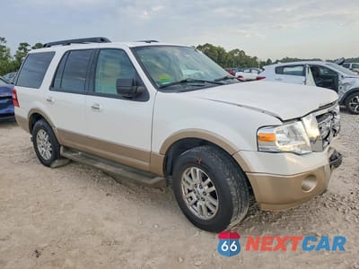 Czwarte zdjęcie samochodu z boku: 2014 FORD EXPEDITION XLT VIN:1FMJU1H54EEF22487 - miniatura