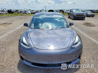 Piąte zdjęcie samochodu w środku: 2021 TESLA MODEL 3 VIN:5YJ3E1EAXMF083076 - miniatura