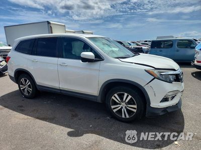 Czwarte zdjęcie samochodu z boku: 2018 HONDA PILOT EXL VIN:5FNYF5H53JB022740 - miniatura