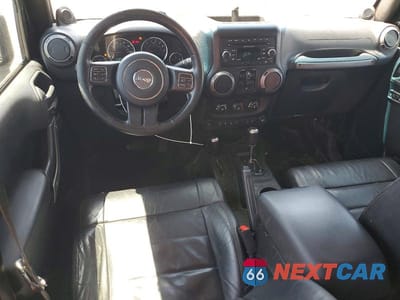 Zdjęcie 8 z 13 samochodu: 2012 JEEP WRANGLER UNLIMITED SPORT VIN:1C4BJWDG6CL274256 - miniatura