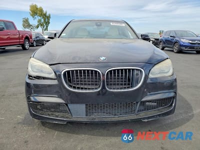 Piąte zdjęcie samochodu w środku: 2015 BMW 740 I VIN:WBAYA6C51FD827028 - miniatura