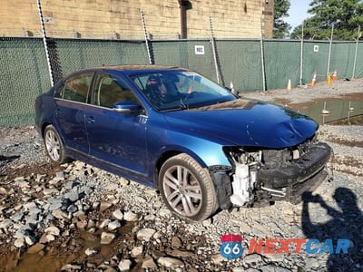 Czwarte zdjęcie samochodu z boku: 2017 VOLKSWAGEN JETTA SEL VIN:3VWL17AJ3HM395923 - miniatura