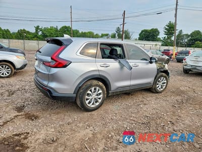 Trzecie zdjęcie samochodu z tyłu: 2023 HONDA CR-V LX VIN:2HKRS4H20PH416903 - miniatura