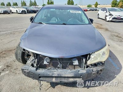 Piąte zdjęcie samochodu w środku: 2014 TOYOTA CAMRY HYBRID SE VIN:4T1BD1FK5EU131321 - miniatura