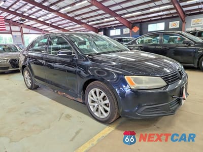 Czwarte zdjęcie samochodu z boku: 2011 VOLKSWAGEN JETTA SE VIN:3VWDZ7AJ1BM359751 - miniatura