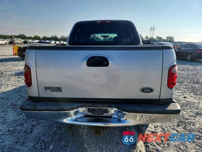 Zdjęcie 6 z 12 samochodu: 2001 FORD F150 SUPERCREW VIN:1FTRW07L31KA40780 - miniatura