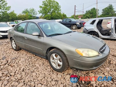 Czwarte zdjęcie samochodu z boku: 2002 FORD TAURUS SE VIN:1FAHP53U42G194901 - miniatura