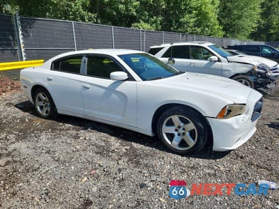 Czwarte zdjęcie samochodu z boku: 2012 DODGE CHARGER POLICE VIN:2C3CDXAG7CH304422 - miniatura