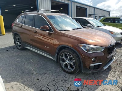 Czwarte zdjęcie samochodu z boku: 2016 BMW X1 XDRIVE28I VIN:WBXHT3C37GP880247 - miniatura