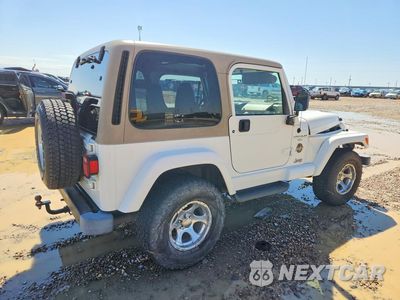 Trzecie zdjęcie samochodu z tyłu: 1999 JEEP WRANGLER / TJ SAHARA VIN:1J4FY49S9XP452829 - miniatura