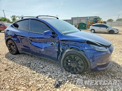 Czwarte zdjęcie samochodu z boku: 2024 TESLA MODEL Y VIN:7SAYGDEEXRF025435 - miniatura