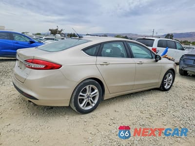 Trzecie zdjęcie samochodu z tyłu: 2018 FORD FUSION SE VIN:3FA6P0HD9JR241320 - miniatura