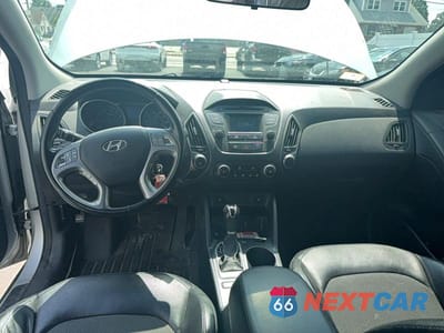 Zdjęcie 9 z 10 samochodu: 2014 HYUNDAI TUCSON SE VIN:KM8JUCAG7EU796599 - miniatura