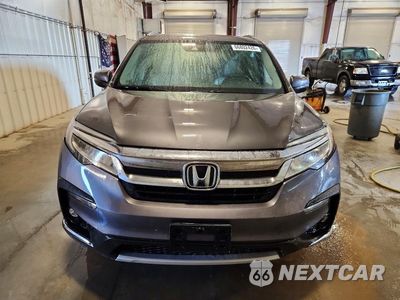 Piąte zdjęcie samochodu w środku: 2019 HONDA PILOT TOURING VIN:5FNYF6H6XKB076505 - miniatura