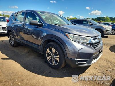 Czwarte zdjęcie samochodu z boku: 2017 HONDA CR-V LX VIN:2HKRW6H32HH214302 - miniatura