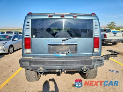 Zdjęcie 6 z 13 samochodu: 2005 HUMMER H2 VIN:5GRGN23U15H116518 - miniatura
