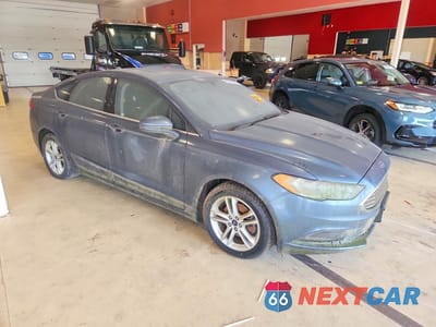 Czwarte zdjęcie samochodu z boku: 2018 FORD FUSION SE VIN:3FA6P0HD5JR210033 - miniatura