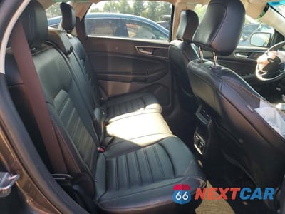 Zdjęcie 11 z 13 samochodu: 2020 FORD EDGE SEL VIN:2FMPK4J9XLBA33793 - miniatura