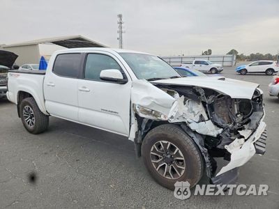 Czwarte zdjęcie samochodu z boku: 2023 TOYOTA TACOMA TRD SPORT VIN:3TMCZ5AN0PM632787 - miniatura