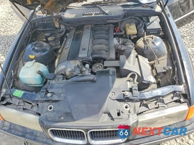 Zdjęcie 11 z 12 samochodu: 1994 BMW 325 IC AUTOMATIC VIN:WBABJ6321RJD37015 - miniatura