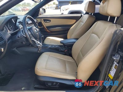 Zdjęcie 7 z 12 samochodu: 2013 BMW 128 I VIN:WBAUN1C55DVR00818 - miniatura