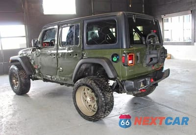 Czwarte zdjęcie samochodu z boku: 2021 JEEP WRANGLER UNLIMITED RUBICON VIN:1C4JJXFM7MW536211 - miniatura
