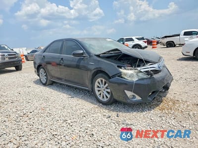 Czwarte zdjęcie samochodu z boku: 2012 TOYOTA CAMRY HYBRID XLE VIN:4T1BD1FK6CU060708 - miniatura