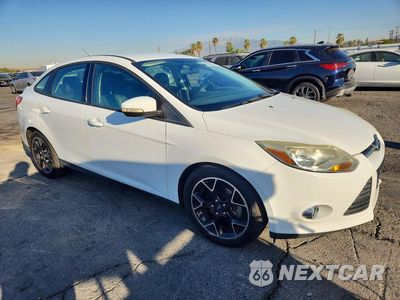 Czwarte zdjęcie samochodu z boku: 2013 FORD FOCUS SE VIN:1FADP3F29DL352978 - miniatura