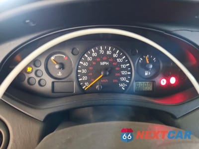 Zdjęcie 9 z 13 samochodu: 2000 FORD FOCUS SE VIN:1FAFP3630YW229639 - miniatura