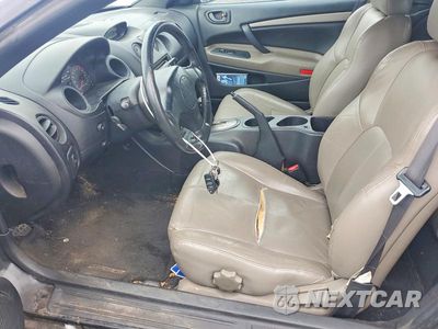 Zdjęcie 7 z 12 samochodu: 2003 MITSUBISHI ECLIPSE SPYDER GS VIN:4A3AE45G73E176213 - miniatura