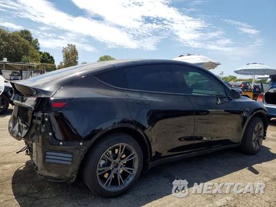 Trzecie zdjęcie samochodu z tyłu: 2024 TESLA MODEL Y VIN:7SAYGDEE7RF118624 - miniatura